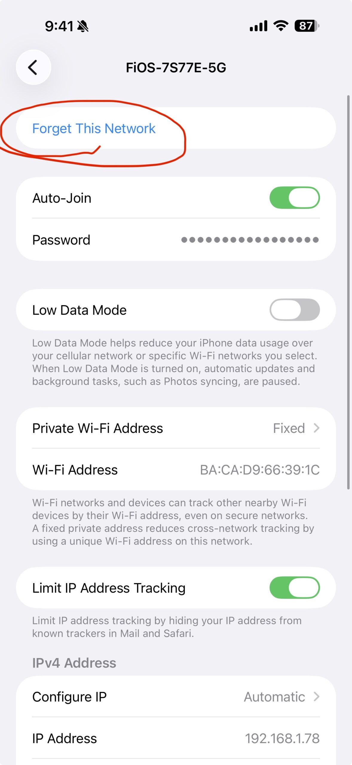 Screenshot of the iPhone Wi-Fi network details screen for FiOS-7S77E-5G. At the very top of the screen, the option "Forget This Network" is shown in blue text. It is circled in red. Below it are toggles for Auto-Join, Password, and Low Data Mode.